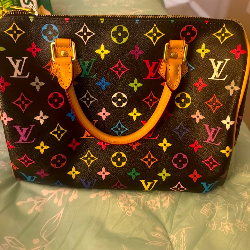Beautiful multicolored purse as is condition